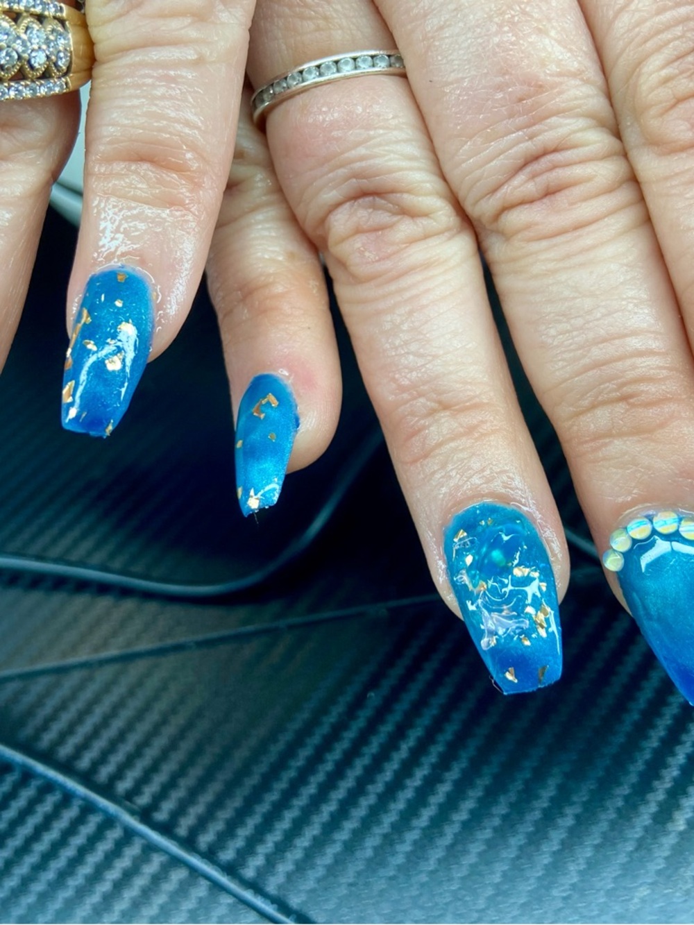 Blue Cateye Nails with Gold Flakes